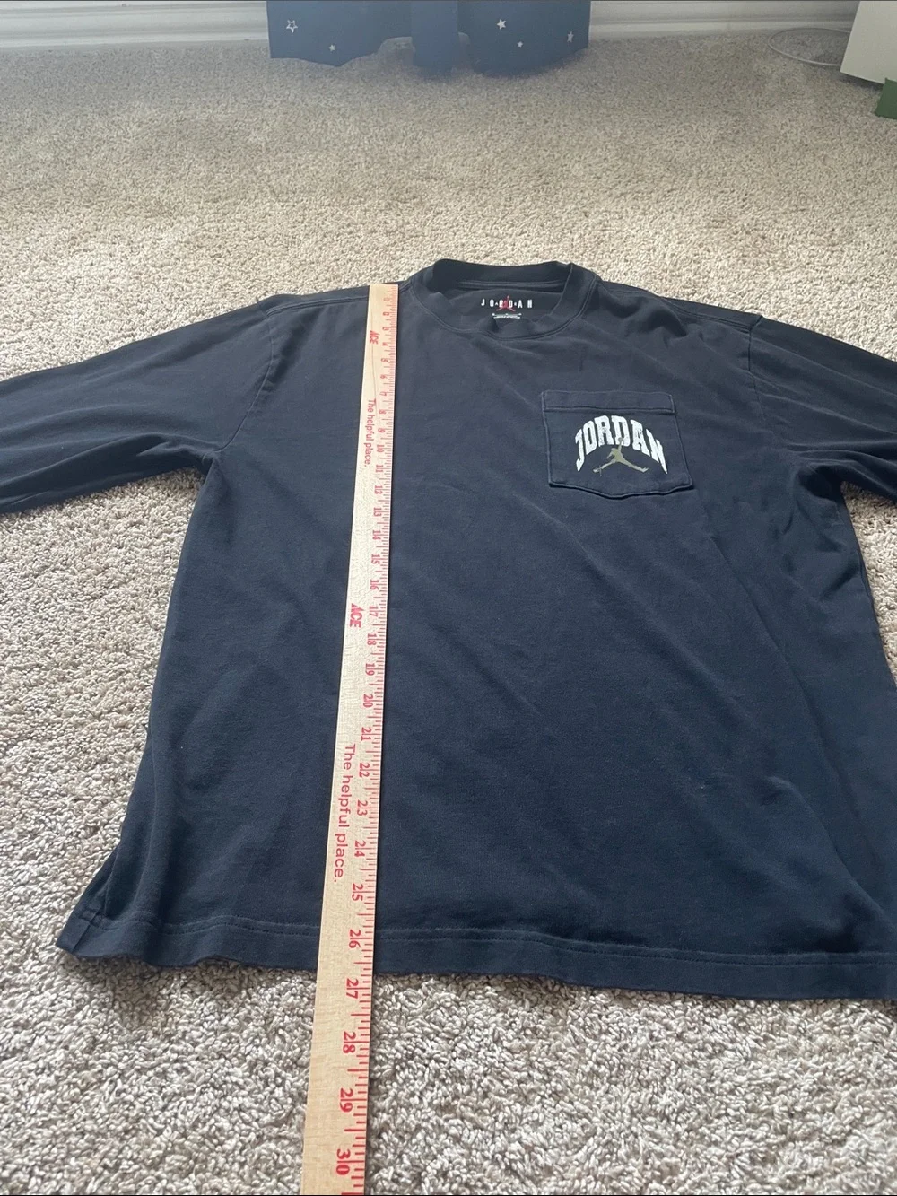 Jordan Long Sleeve Pocket Tee in Black with White Logo